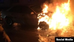 Burning car of cameraman journalist Vadim Boreyko