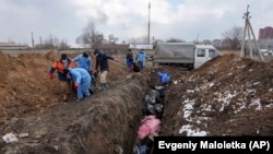 Масавыя пахаваньні ў Марыюпалі