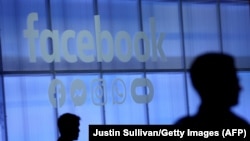 Facebook logo is displayed during the F8 Facebook 