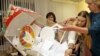 Belarus -- Members of a local electoral commission empty a ballot box to count the ballots at the end of parliamentary elections in Minsk, September 11, 2016